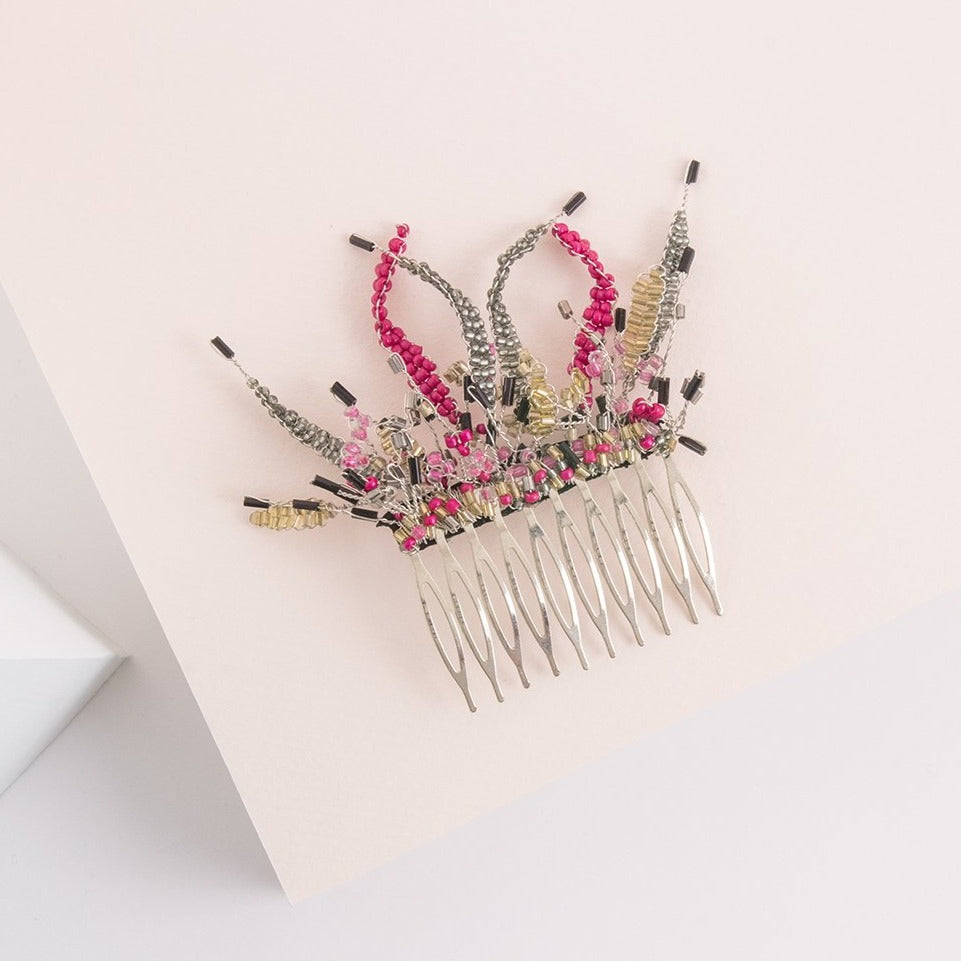 Peineta plata y fucsia