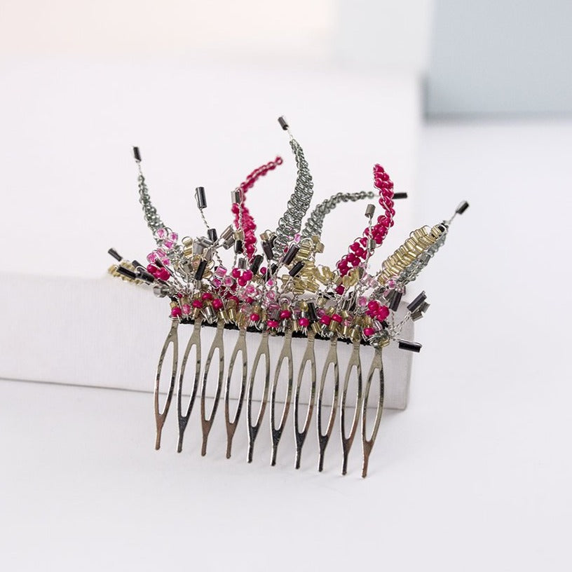 Peineta plata y fucsia