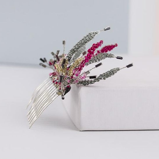 Peineta plata y fucsia