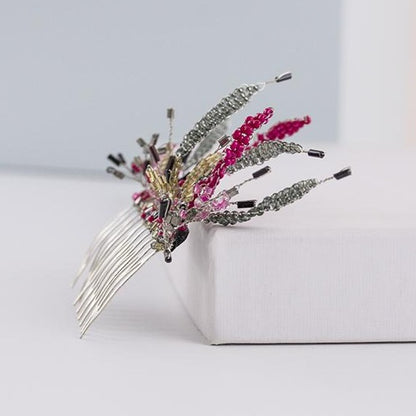 Alquiler de tocado peineta Joya fucsia