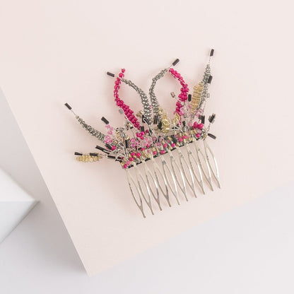 Peineta plata y fucsia