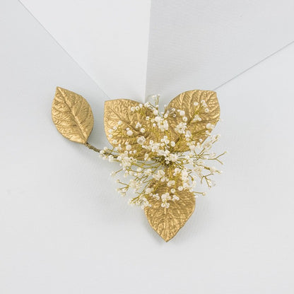 Tocado de porcelana flor aguacate dorado