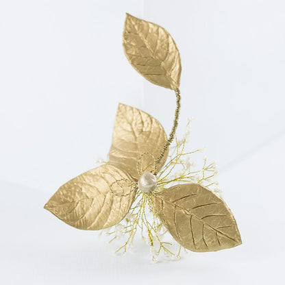 Tocado de porcelana flor aguacate dorado