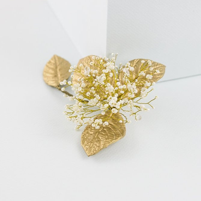 Tocado de porcelana flor aguacate dorado