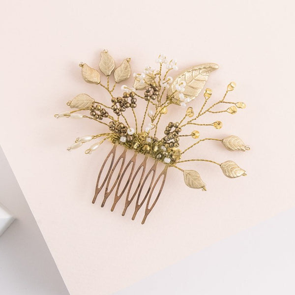 Peineta florecer con hojas de porcelana oro