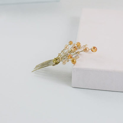 Peineta pequeña de piedras oro y crema