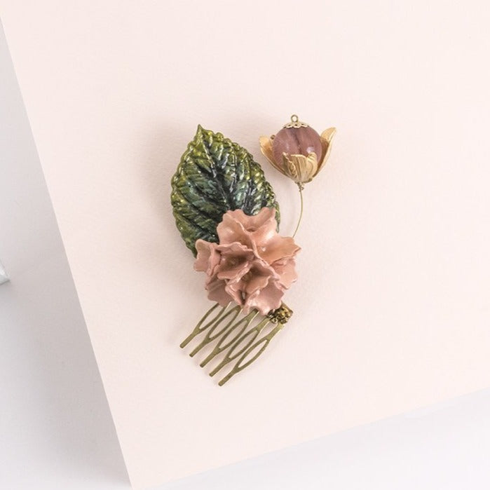 Peineta porcelana flor de tabaco coral y oro