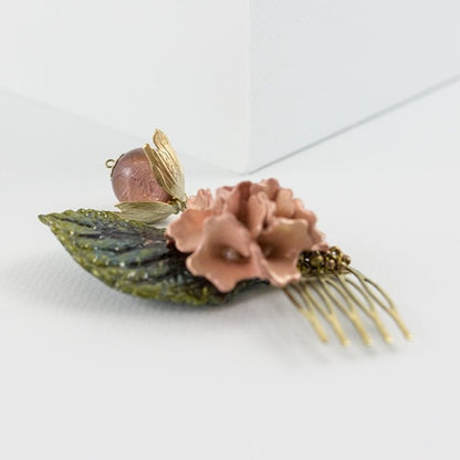 Peineta porcelana flor de tabaco coral y oro