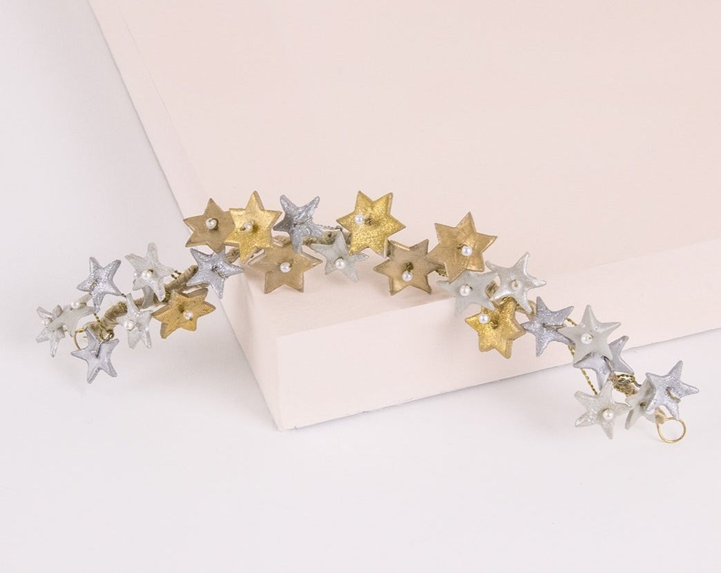 Tocado de porcelana estrellas oro y plata