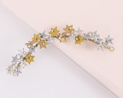 Tocado de porcelana estrellas oro y plata