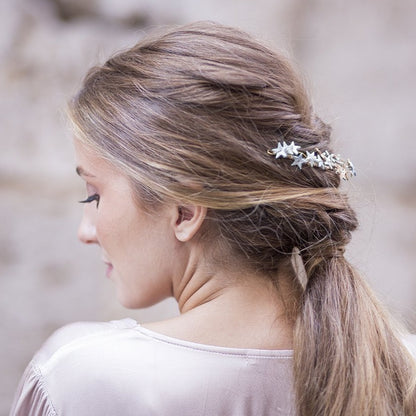 Tocado de porcelana estrellas oro y plata