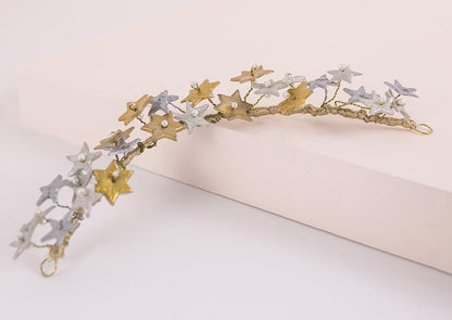 Tocado de porcelana estrellas oro y plata